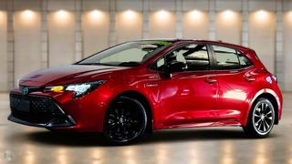 2023 Toyota Corolla Ascent Sport Hybrid Hatch (Jasper Red) Pre-Owned Car Thumbnail